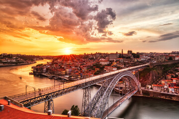 Wall Mural - Porto Aerial Cityscape with Luis I Bridge and Douro River at Amazing Sunset