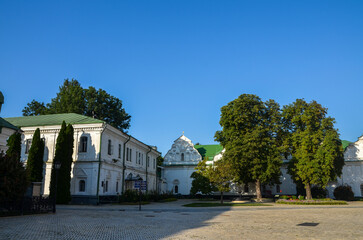 Wall Mural - Old inner courtyard with buildings exterior of the Kyiv Pechersk Lavra or Monastery of the Caves. Ukraine