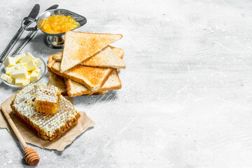 Poster - Breakfast. Toasted bread, honey with orange jam and butter.