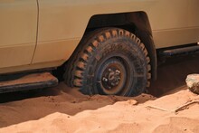Lower Section Of An Off Road Vehicle Stuck In The Sand At Chalbi Desert, Marsabit County, Kenya