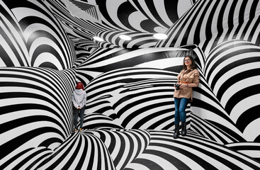 women in room with optical illusion