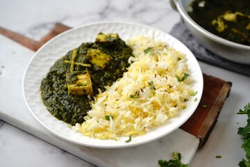 Wall Mural - Homemade Palak Paneer or Indian cottage cheese spinach curry served with rice