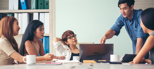 Poster - Banner diversity business people brainstorming meeting in conference room. Panorama multiracial businesspeople meeting discuss team partner. Happy asian caucasian team in meeting room with copy space