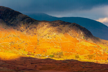 Wall Mural - Shadows in the colorful Connemara hills