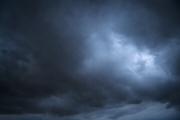 White and grey clouds scenic nature environment background. Storm clouds floating in a rainy day with natural light. Cloudscape scenery, overcast weather above blue sky.