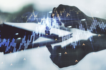 Poster - Multi exposure of abstract financial diagram with world map and hand working with a digital tablet on background, banking and accounting concept