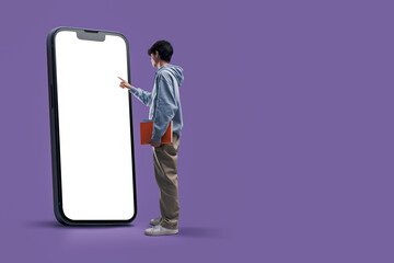 Student interacting with a touch screen smartphone