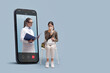 © stokkete - Online doctor assisting a patient