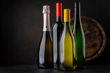 Fototapeta  - White and red wine bottles