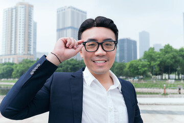 Sticker - Photo of Asian businessman outdoors