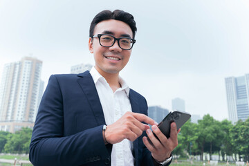 Sticker - Photo of Asian businessman outdoors