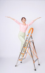 Poster - Image of young Asian woman clamb up to the ladder