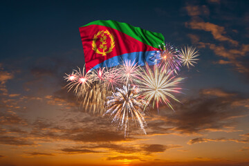 Wall Mural - Flag of Eritrea and Holiday fireworks in sky