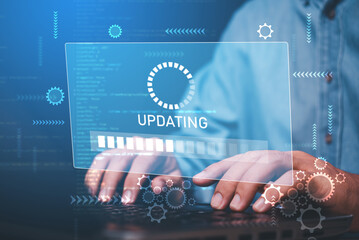 Fototapete - businessman hand working with laptop and virtual update screen , software system update process