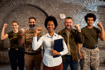 Wall Mural - Portrait of smiling diverse veterans at PTSD support group.