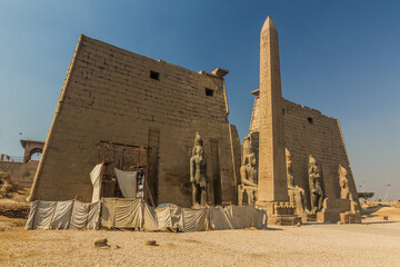 Wall Mural - Ramesses II obelisk in front of the Luxor temple pylon, Egypt