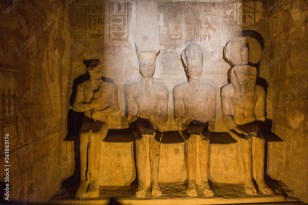 Statue Rays Statues of Ptah, Amun Ra, king Ramesses II and Ra-Horakhty illuminated ...