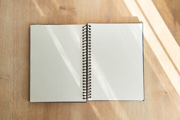 Wall Mural - notebook on wood background