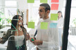 © BullRun - Concentrated colleagues working together in office