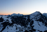 Fototapeta Do pokoju - Wonderful scenery after a snow storm during a calm morning. The Swiss snowy landscape.