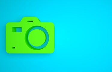 Wall Mural - Green Photo camera icon isolated on blue background. Foto camera. Digital photography. Minimalism concept. 3D render illustration