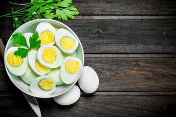 Poster - Boiled eggs in a bowl with parsley.