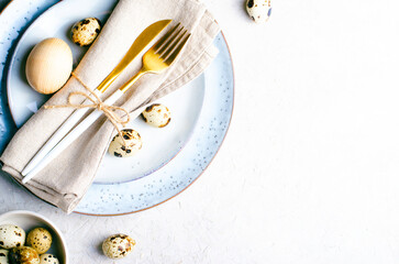 Wall Mural - Easter Table Setting with Quail Eggs on Grey Background, Festive Happy Easter Concept