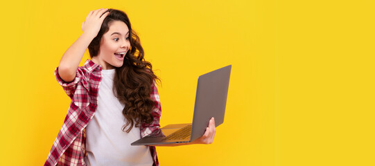 Canvas Print - surprised teen girl use laptop for blogging. webinar at online education. School girl portrait with laptop, horizontal poster. Banner header with copy space.