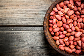 Wall Mural - The shelled peanuts in a bowl .