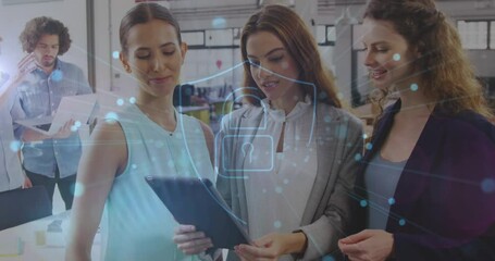 Poster - Animation of security padlock icon and spots over three diverse woman using digital tablet at office