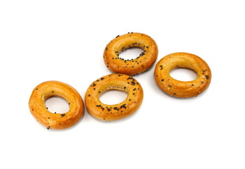 Wall Mural - Bagels with poppy seeds on a white background. Poppy seeds bagel isolated.