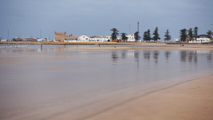 Essaouira beach in Morocco with the ancient Medina in the background