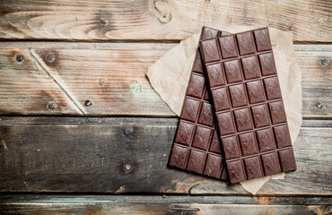 Canvas Print - Chocolate bars on paper.