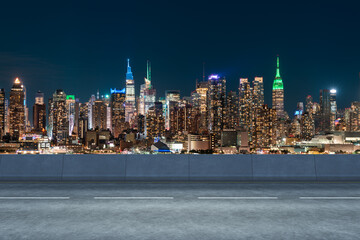 Wall Mural - Empty urban asphalt road exterior with city buildings background. New modern highway concrete construction. Concept of way to success. Transportation logistic industry fast delivery. New York. USA.