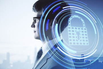 Poster - Portrait of young european businessman with abstract padlock button on city background with mock up place. Web safety, protection and digital technology concept. Double exposure.