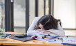 © David - tired business Asian woman sleep and bored from sitting at a desk for a long time in workplace office  finance analysis concept.