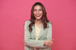 © NaMong Productions - Happy cheerful young woman laugh looking at camera with joyful and charming smile isolated on pink studio background.