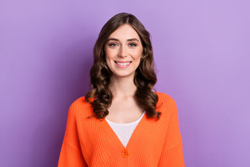 Sticker - Photo portrait of young cheerful satisfied glad lady toothy beaming smile wear orange jumper enjoy her hr vacancy isolated on purple color background