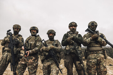 Wall Mural - Soldiers on a shooting range looking concentrated and attentive