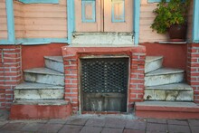 The Threshold Of An Old Vintage House And The Door That Went Underground