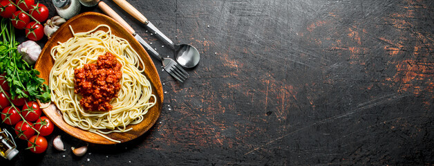 Sticker - Spaghetti with Bolognese sauce in a plate with tomatoes, parsley and garlic.