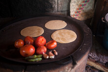 Corn Tortillas, Tomatoes And Green Chillies Grilled In "Tepetlixpa Seed Bank", Created By Tomas Villanueva Buendia "Tomaicito" To Protect And Rescue The Original Varieties Of Mexic