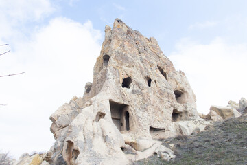 Wall Mural - Cave houses in cones sand hills.