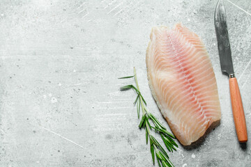 Poster - Fish fillet with knife and rosemary.