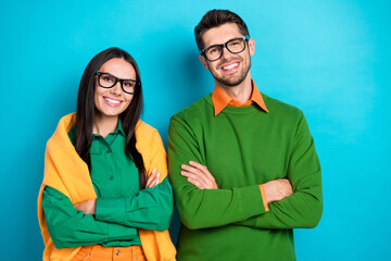 Sticker - Photo of optimistic successful managers family team crossing arms ready doing work isolated on blue color background