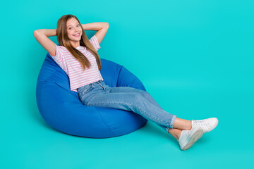 Poster - Full length photo of sweet shiny lady wear striped t-shirt arms behind head empty space isolated turquoise color background