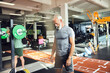 © Flamingo Images - Mature man lifting weights in a gym