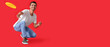 © Pixel-Shot - Happy young man throwing frisbee disk on red background with space for text