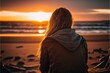 © ThisDesign - woman sitting in front of the beach sunset, Generative AI