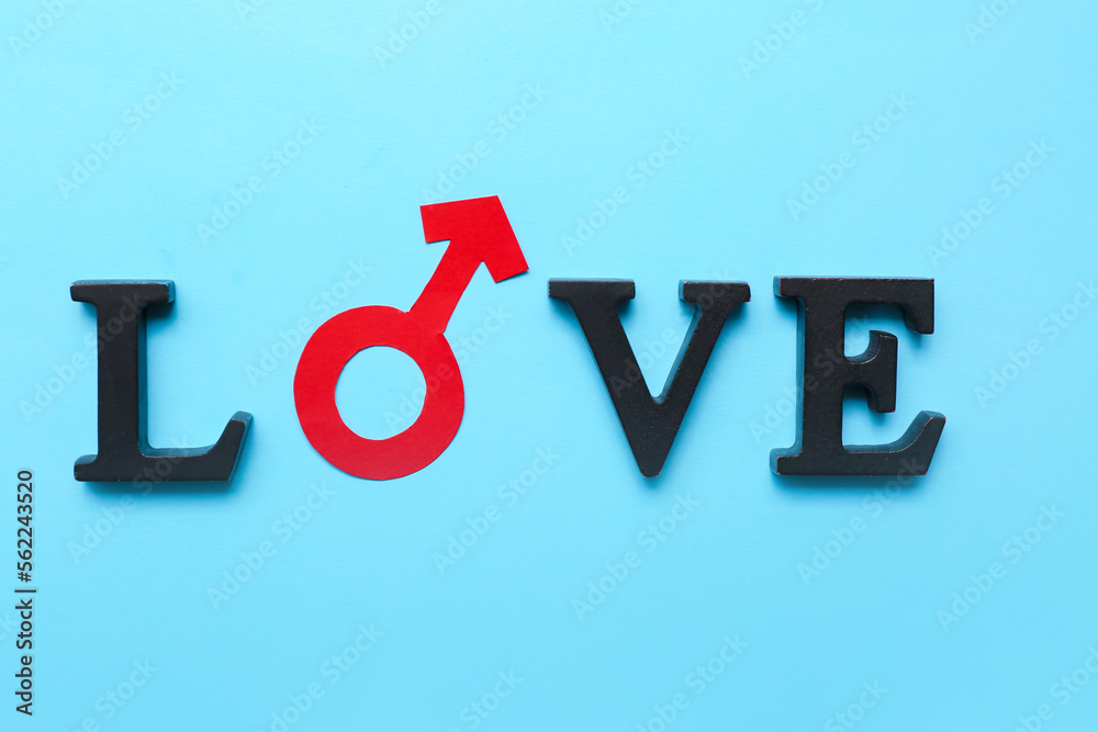 Word LOVE with symbol of man on blue background. Valentine's Day celebration